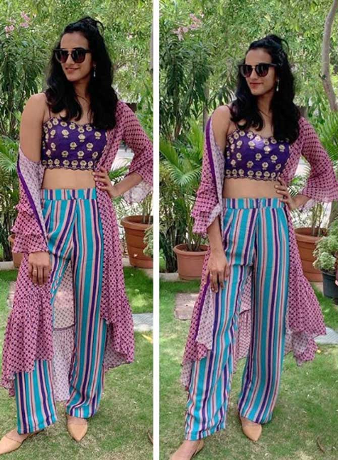 PV Sindhu shared this photo on Instagram and captioned it 'Riot of colors and Happy vibes! #colourfulvibes @krupakapadialabel Styling- @caldeirabornal