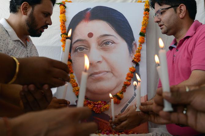 Members of the Bharatiya Janata Party (BJP) pay tribute to India's former foreign minister Sushma Swaraj in Amritsar, Punjab