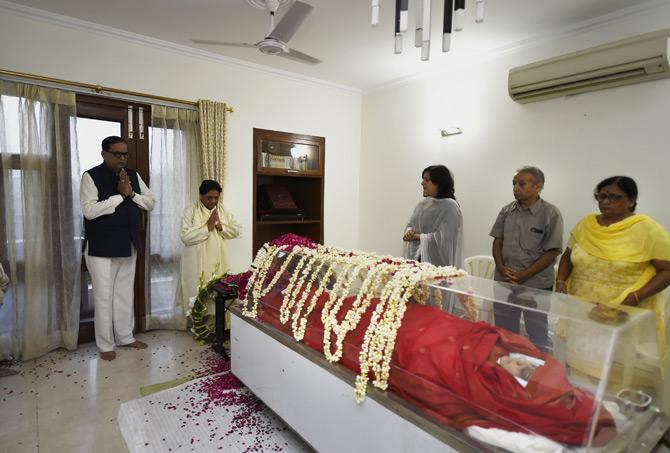In picture: Bahujan Samaj Party chief Mayawati and party leader Satish Chandra Misra pay tribute to the mortal remains of former external affairs minister Sushma Swaraj at her residence in New Delhi.