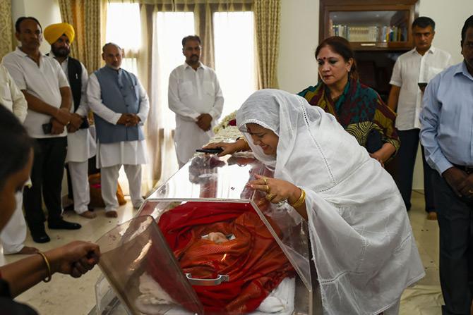 In pic: An unidentified woman gets emotional as she pays tributes to the former external affairs minister Sushma Swaraj at her residence in New Delhi.
