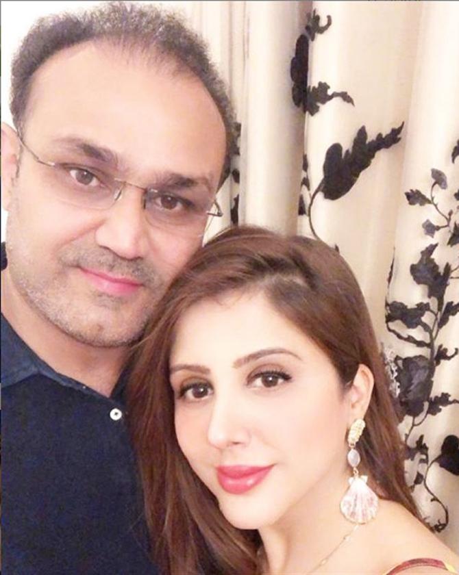 Former Indian batsman Virender Sehwag who was known for his swashbuckling batting has a Bachelors degree from Jamia Millia Islamia University.
In pic: Virender Sehwag with wife