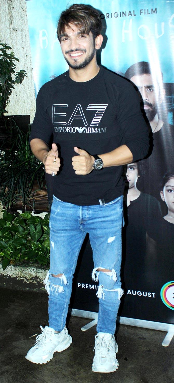 Television actor Arjun Bijlani was all smile as he arrived for the special screening of Barot House at a preview theatre in Juhu.