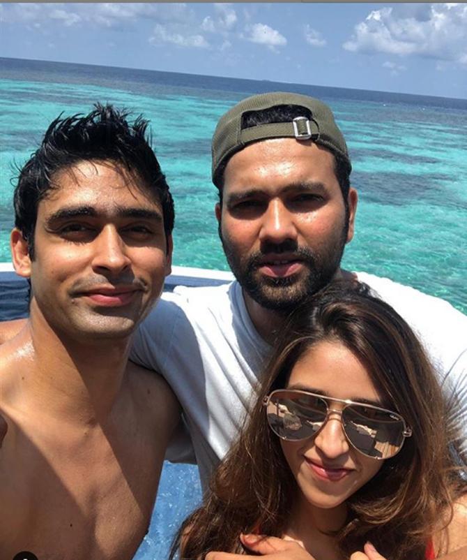 Rohit Sharma shared this picture with Ritika Sajdeh and her brother during a holiday and wrote, 