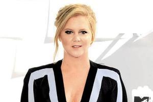 Amy Schumer calls parenting 'nuts'