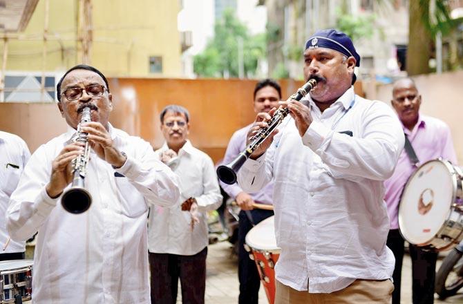 Band member Niranjan Patil seen playing the clarinet