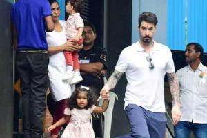 Daniel Weber spotted with his kids at a preschool in Juhu