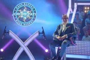 Whose feet did Amitabh Bachchan touch for blessings in KBC?