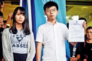 Hong Kong swoops down on activists, stifles weekend protests