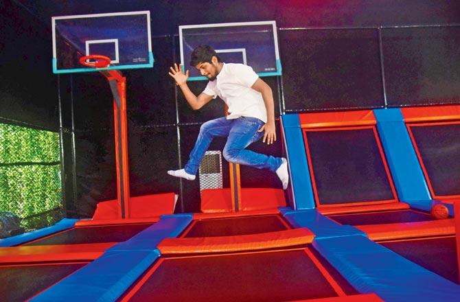 An instructor says 20 minutes of a session at the Trampoline Park is equal to one cardio exercise