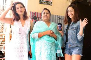 Yami Gautam with sister Surilie, Kriti Sanon at multiplex in Juhu