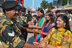 Women tie 'rakhis' for BSF jawans on Independence Day at Wagah border