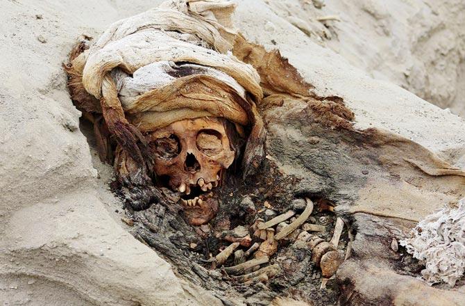 Remains of one of the children uncovered by archaeologists in the Pampa La Cruz sector in Huanchaco