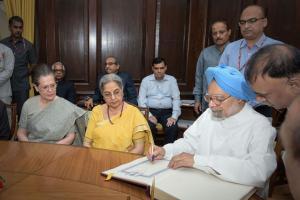 Former PM Manmohan Singh takes oath as Rajya Sabha member 