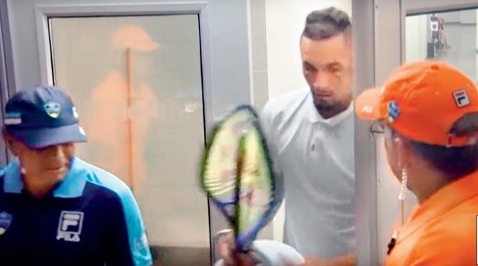 A screengrab of Australian Nick Kyrgios with his two broken racquets