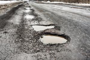 City needs solutions to potholes without rigmarole