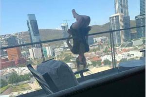 Girl falls 80 feet while performing yoga over the edge of her balcony