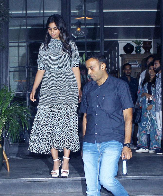Post her appearance at the school's annual event, Isha Ambani and Anand Piramal were snapped on a lunch date at a popular eatery in Juhu. For her outing, Isha donned a grey multi-layered maxi dress, while Anand Piramal opted for a plain white shirt