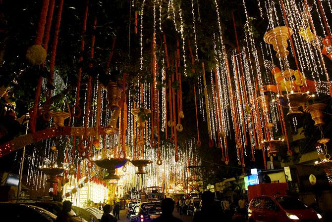In photo: Ambani's residence Antilia, located on Peddar Road in South Mumbai was all decked up with fresh flowers, colourful lights and festoons for Isha and Anand's grand wedding