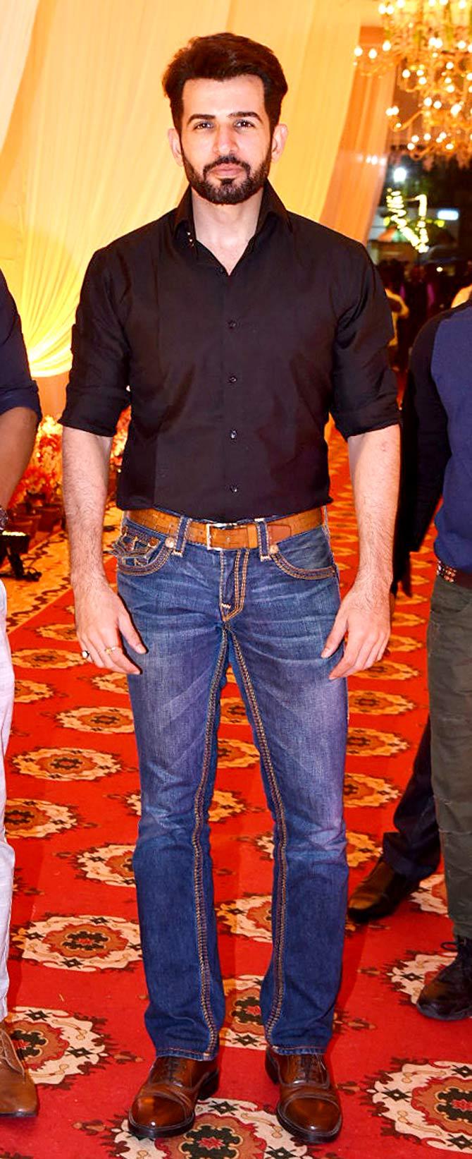 Television actor Jay Bhanushali sported a black shirt and denim as he arrived for make up man Raju Naag's son's wedding in Borivli.