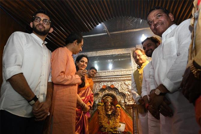In photo: Maharashtra CM Uddhav Thackeray and wife Rashmi Thackeray pose for a picture after offering their prayers at Ekvira temple in Pune