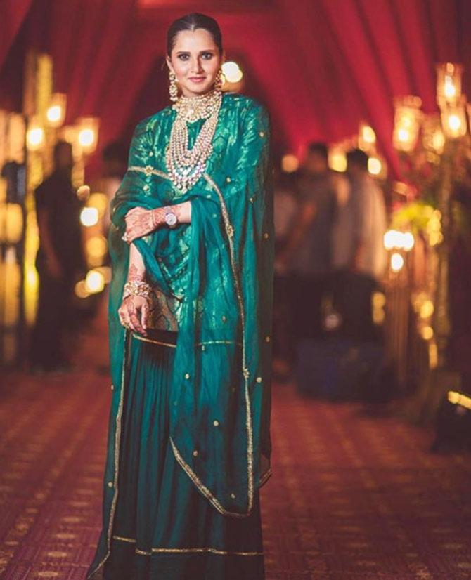 Sania Mirza looked stunning in a teal sharara coupled with gold embroidery.