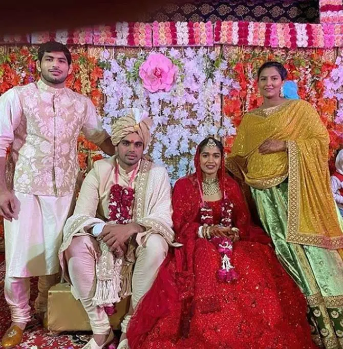 In picture: Geeta Phogat with husband Pawan Kumar during her sister Babita Phogat's wedding