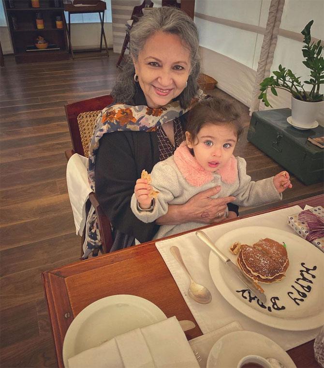 An adorable picture of Sharmila Tagore and Inaaya Naumi Kemmu while the grandmother-granddaughter duo is enjoying their breakfast. Soha posted this image in which her little daughter is seen curled up in her grandmother's arms. She captioned it: Birthday pancakes!!