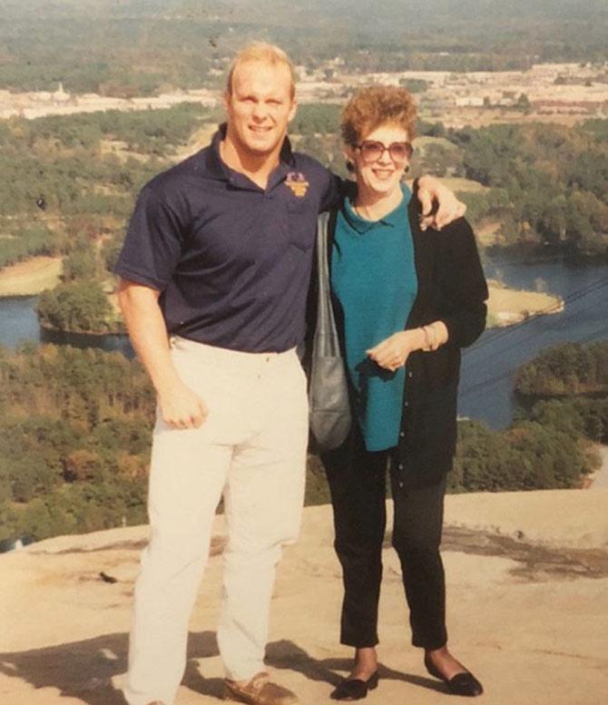 Stone Cold Steve Austin made his wrestling debut in 1989 and retired in 2003.
Stone Cold Steve Austin captioned this picture: Stunning Steve Austin and Mom at Stone Mountain Georgia right after the ‘American Dream’ Dusty Rhodes hired me in Atlanta for World Championship Wrestling. Dusty was the booker at this time and said he saw ‘potential’ in me as a young heel. Dusty was one of the main reasons I fell in love with wrestling. His presence and influence on the business will never die.