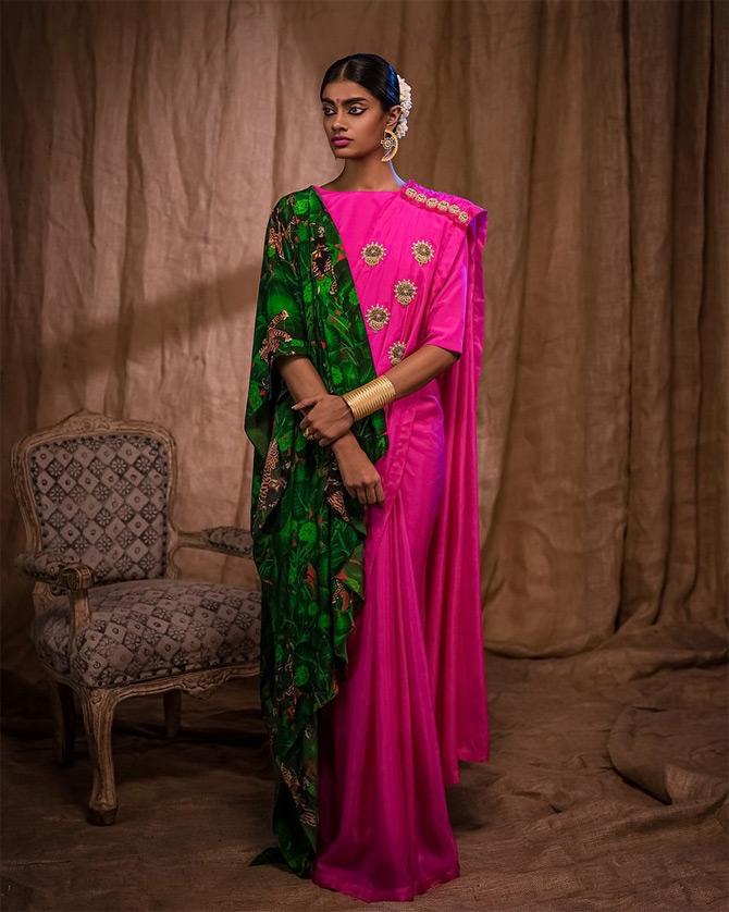 Based in Bengaluru, she is a commerce graduate and has been active in the fashion circuit since 2010. Here, she personifies elegance in a bright pink sari with a green shawl from the House of Masaba.