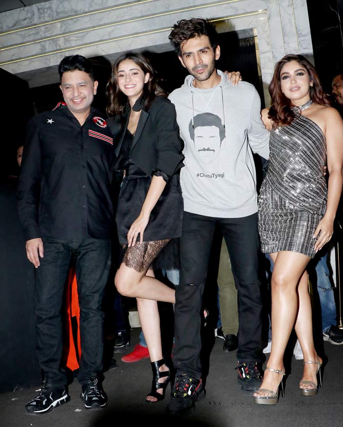 Kartik Aaryan, Ananya Panday and Bhumi Pednekar attended the success bash of their film Pati Patni Aur Woh at a popular restaurant in Bandra, Mumbai. The film directed by Mudassar Aziz's is a remake of BR Chopra's 1978 classic of the same name. All pictures/Yogen Shah
In picture: Kartik Aaryan, Ananya Panday, Bhumi Pednekar with producer Bhushan Kumar at the success party of their film.