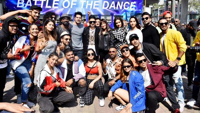 Street Dancer 3D trailer was launched with great fun and fair at a mall in Andheri, Mumbai. Keeping up the uniqueness factor, Varun Dhawan, Shraddha Kapoor, Nora Fatehi, Prabhu Deva, director Remo D'Souza, and producer Bhushan Kumar hopped into an open bus and interacted with the fans at the launch event. All pictures/Yogen Shah and Pallav Paliwal