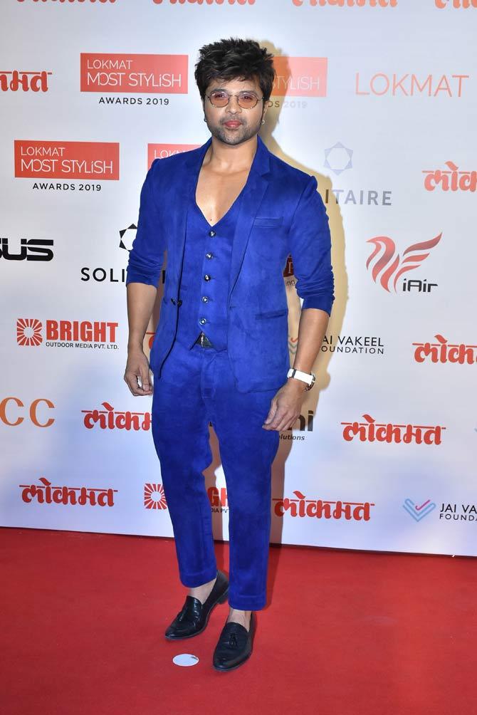 Himesh Reshammiya was all smiles when snapped by the shutterbugs at the red carpet event hosted in the city.