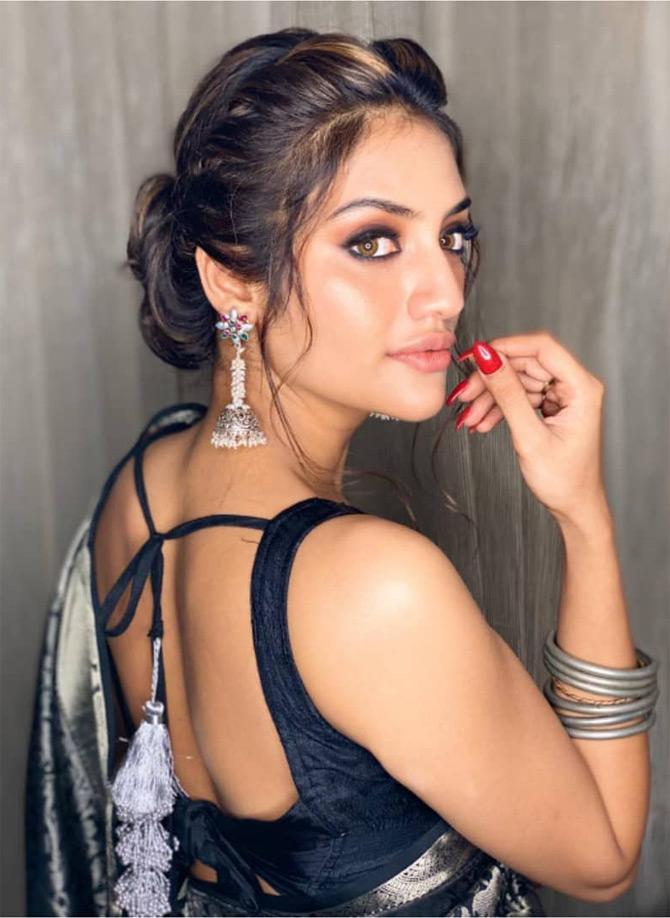 670px x 918px - Nusrat Jahan shows us why the colour black is classic and timeless