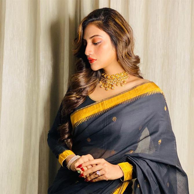 The new-age political leader from Kolkata looks graceful in a beautiful black saree which she paired with a beautiful gold neckpiece and teamed it with a pair of diamond bangles. While sharing this picture filled with grace, Nusrat wrote: Black is an acquired taste, six yards of pure grace...!