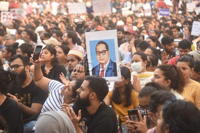 Protesters in Mumbai display a picture of Dr B R Ambedkar. Picture courtesy: Atul Kamble