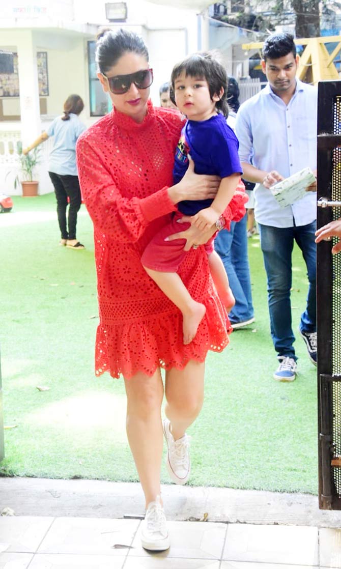 Taimur Ali Khan is the kind of kid who makes headlines for everything he does or says. His third birthday celebration is no exception. Tim, who has established a solid fan base for himself is now a year older, and his proud parents decided to celebrate it a day earlier.
In picture: Kareena Kapoor Khan with Taimur Ali Khan at the birthday venue.