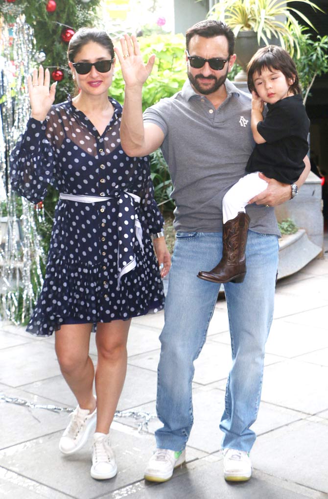 While Kareena was seen putting her best fashion foot forward in a polka dot dress, Saif Ali Khan was snapped in a grey polo-neck t-shirt, paired with basic denim and white shirt. Taimur Ali Khan looked adorably cute in his black tee, paired with white pants and ankle-length boots for the bash.