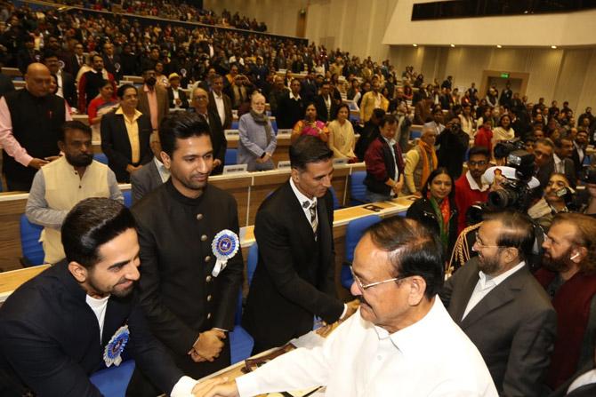 Veteran actor Amitabh Bachchan was supposed to be honoured with the prestigious 50th Dadasaheb Phalke Award, Indian cinema's biggest honour in his 50th year in the Indian film industry. But the actor on Sunday announced his regret in attending the awards due to his health restrictions.