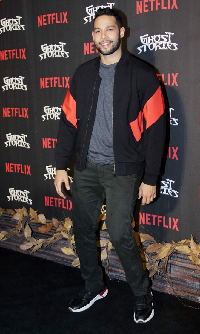 Siddhant Chaturvedi sported a black bomber jacket, paired with basic grey tee and denim for the special show of the movie.