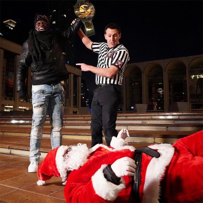 In what could be called a Christmas miracle the 24/7 title was exchanged thrice on Raw! Akira Tozawa first blindsided R-Truth to take the title, before a man dressed as Santa shocked Tozawa to take the title from him. But it was R-Truth who got his 24/7 title back after pinning Santa once again. Go Truth!