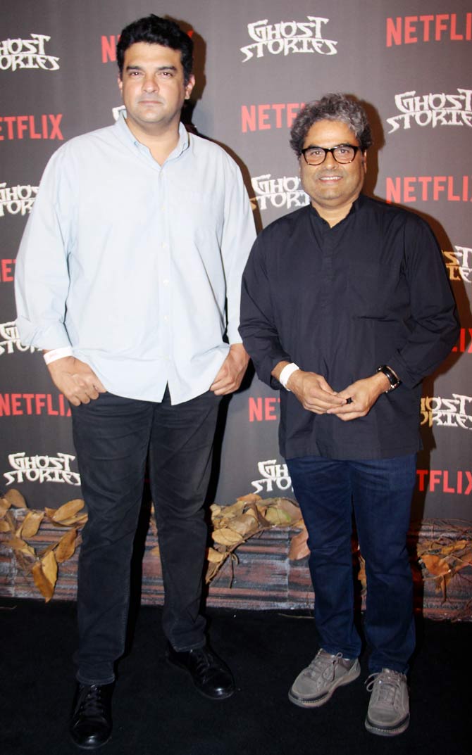 Siddharth Roy Kapur and Vishal Bhardwaj posed for the shutterbugs at the special screening of the movie.