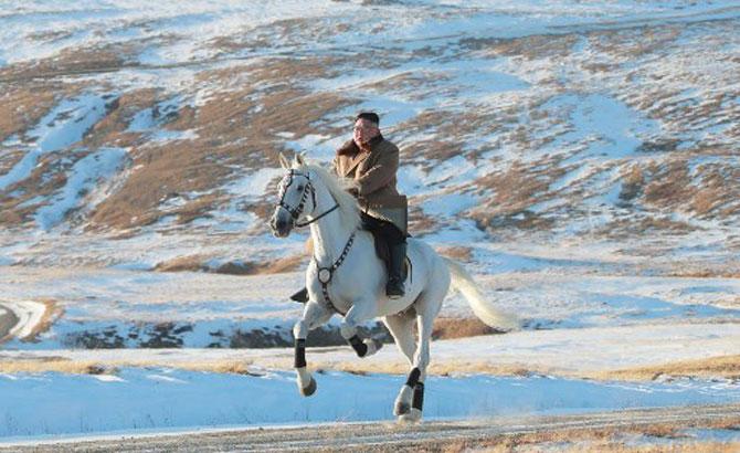 This undated picture released by Korean Central News Agency on October 16, 2019, shows North Korean leader Kim Jong-Un riding a white horse amongst the first snow at Mouth Paektu.