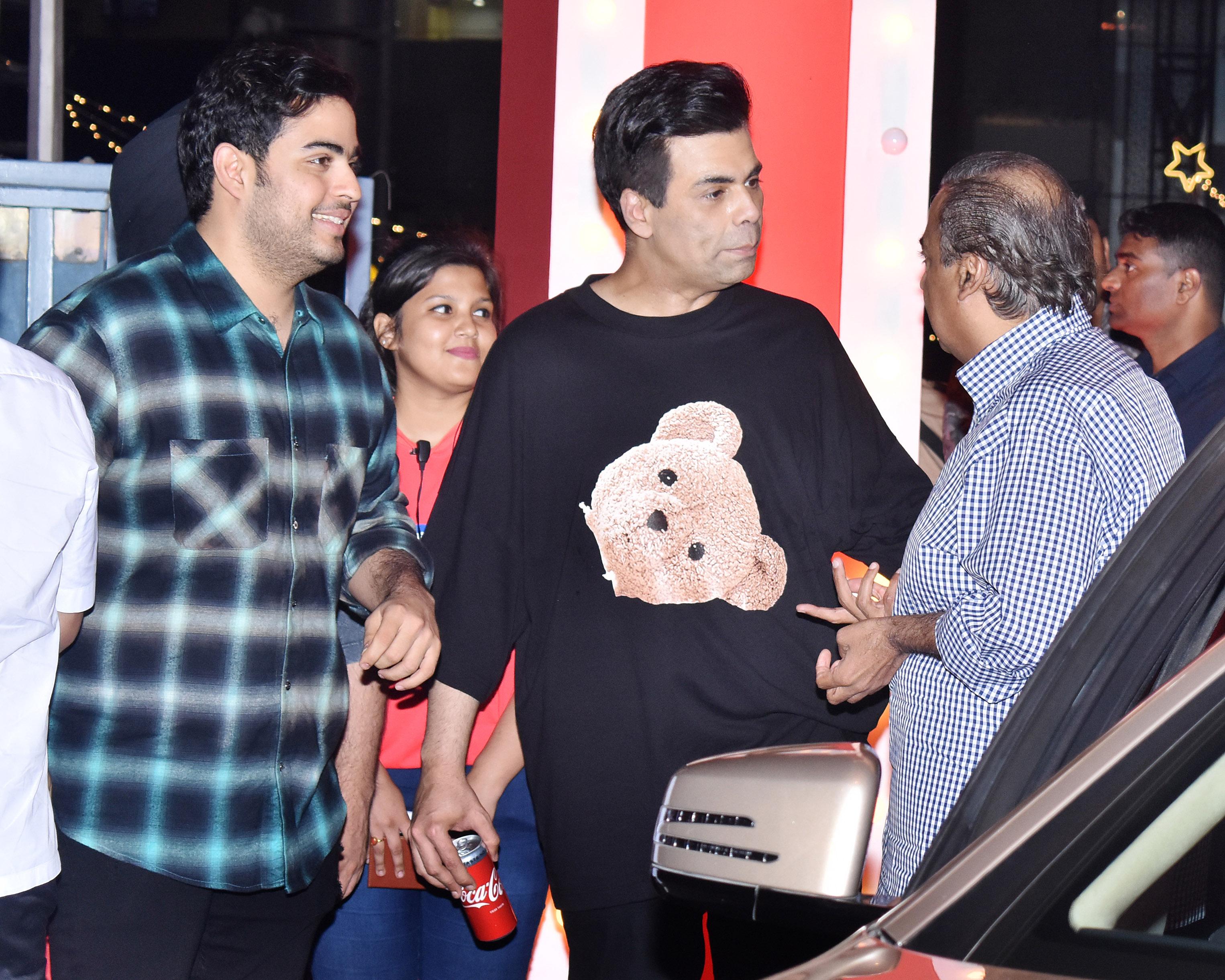Karan Johar, who came in with his children Yash and Roohi was seen having a candid conversation with the father-son duo Mukesh and Akash Ambani