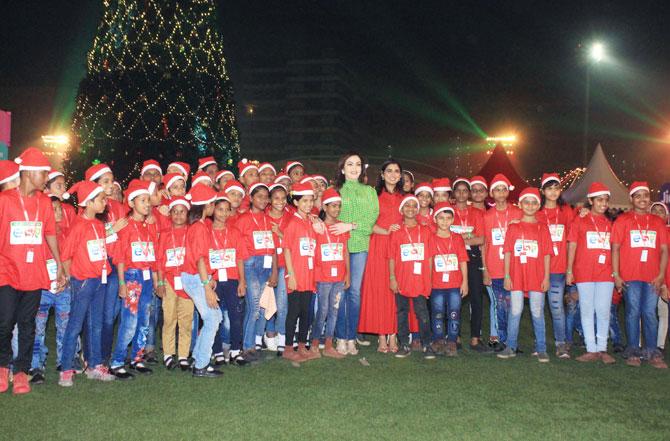 Nita Ambani Sex Vedio - Nita, Isha Ambani celebrate Christmas with 4,000 underprivileged kids