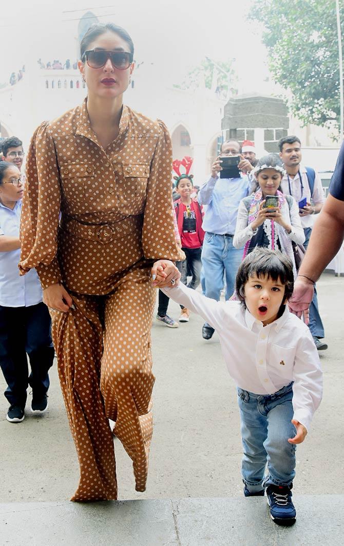 Kareena Kapoor Khan was snapped at Bandra church with son Taimur Ali Khan and mother Babita, to celebrate Christmas on December 25. The trio was later headed to a family gettogether. All pictures/Bipin Kokate and Yogen Shah