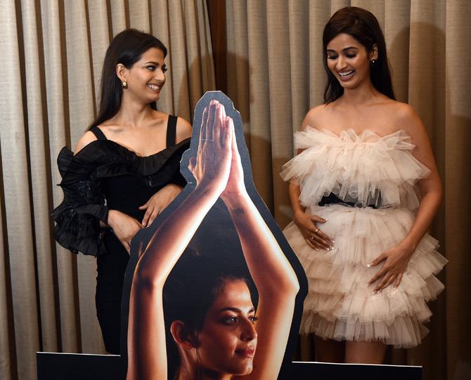In photo: Sanjana Vij and Shivani Jadhav share a light moment at the calendar launch of a popular Bandra gym in Juhu