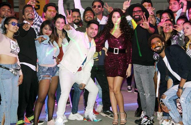 Street Dancer 3D produced by Bhushan Kumar, Krishan Kumar and Lizelle D'Souza, directed by Remo D'Souza, starring Varun Dhawan, Shraddha Kapoor, Prabhudeva & Nora Fatehi releases on 24th January 2020.
In picture: Varun Dhawan and Fatehi with the cast of Street Dancer 3D.