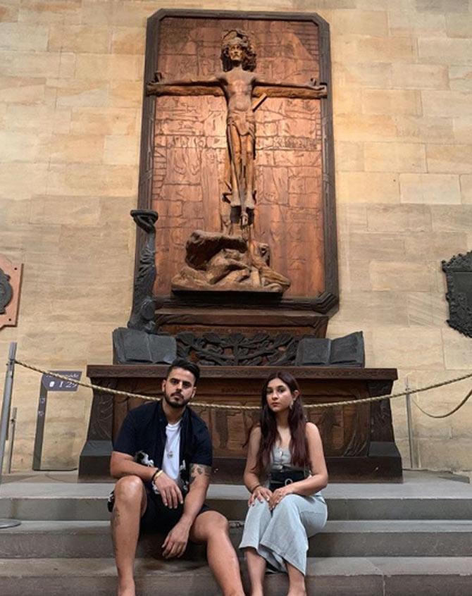 Nitish Rana and Saachi Marwah at St. Vitus Cathedral in Prague. He captioned it, 'Stuck between the year 925 when Prince Václav founded a Romanesque rotunda here & the year 2019 where i still walk through the different eras'