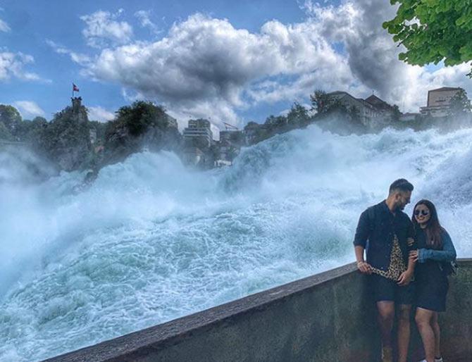 Nitish Rana and Saachi Marwah at Rhine Fall Switzerland. He captioned this photo: Our very own surreal 11:11 moment
