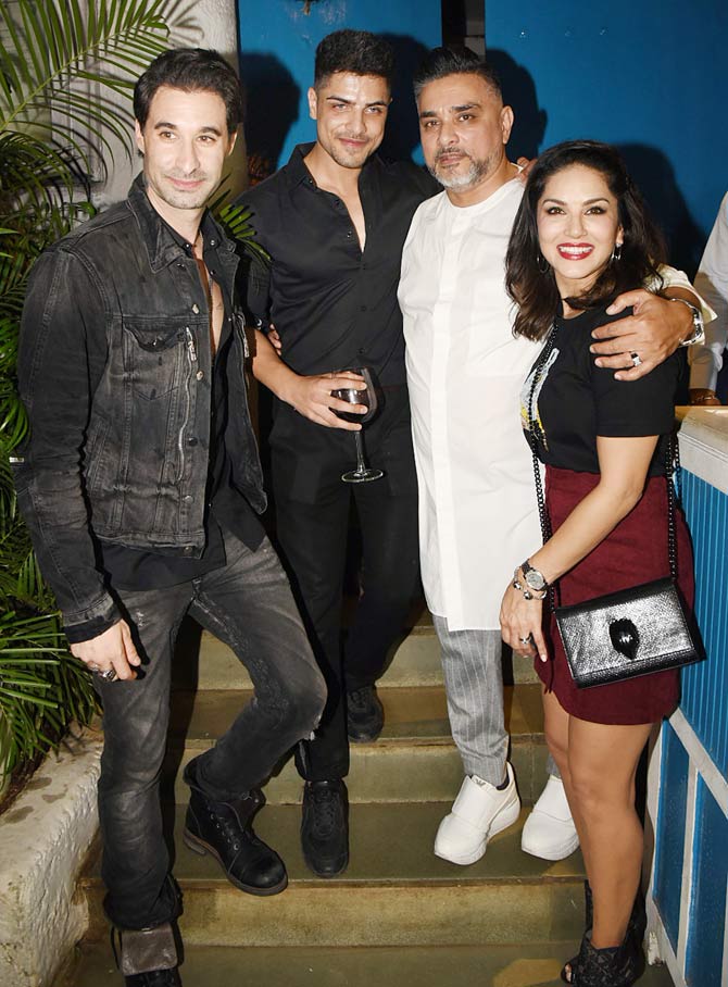 Sunny Leone came in with husband Daniel Weber for the birthday party at the Bandra eatery. Sunny looked pretty in her maroon skirt and black printed tee.